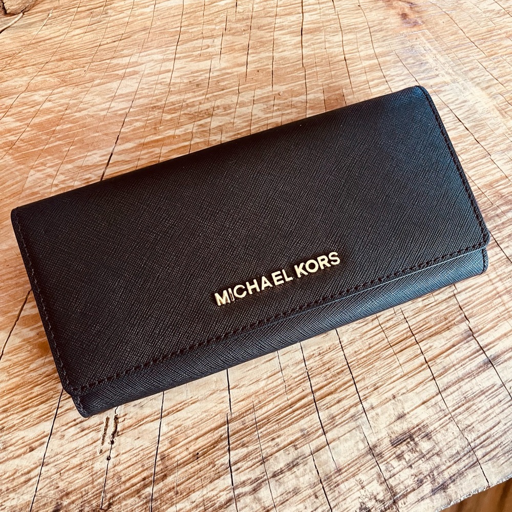 MICHAEL KORS NWOT black billfold wallet. Excellent, new condition!